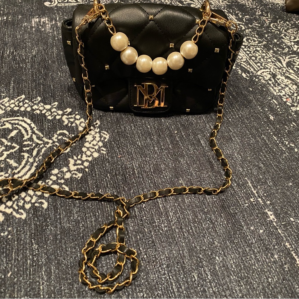 Adorable black with pearl and stud embellishments crossbody!